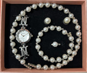 Conjunto de joyas plateado con perlas aleatorio.