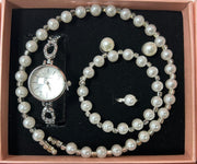 Conjunto de joyas plateado con perlas aleatorio.