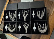 Conjunto de joyas plateado con joyero