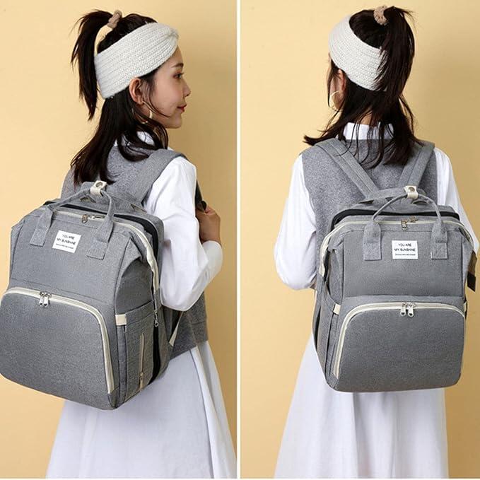 Mochila pañales con cuna plegable bebé