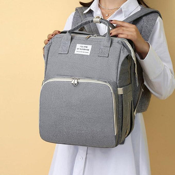 Mochila pañales con cuna plegable bebé